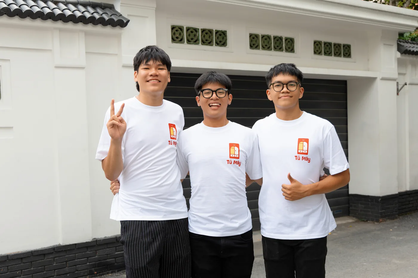 Three crew members at a customer gate